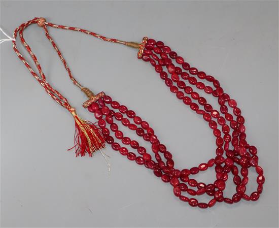 An Indian four strand ruby bead necklace